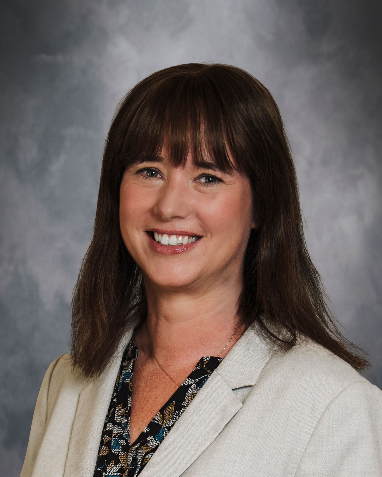   Professional headshot of Gina Knapp